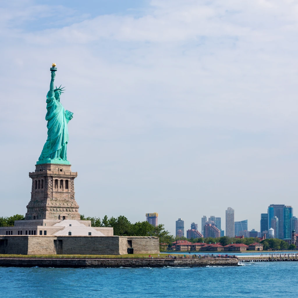 The Statue of Liberty with the New York City skyline behind, USA