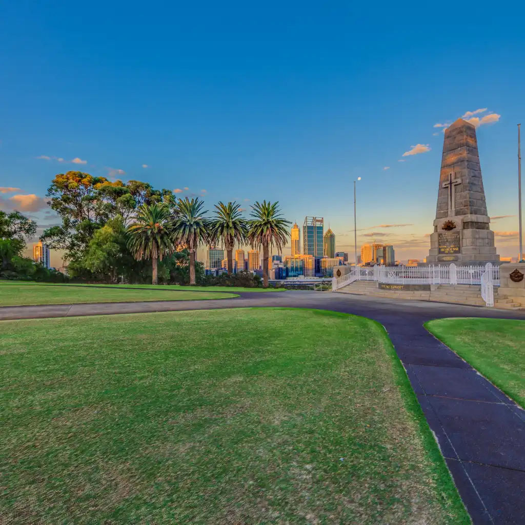 Kings Park Perth city skyline view from lookout path near war memorial at sunset