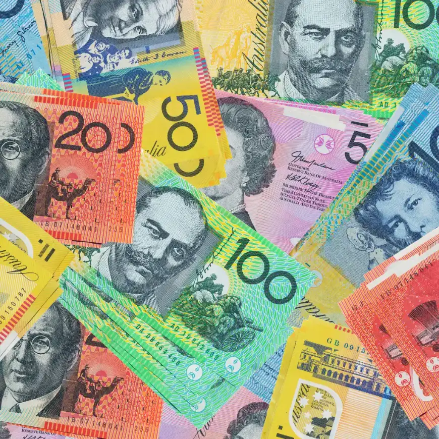 Australian banknotes pile illustrating Perth Australia trip costs in AUD
