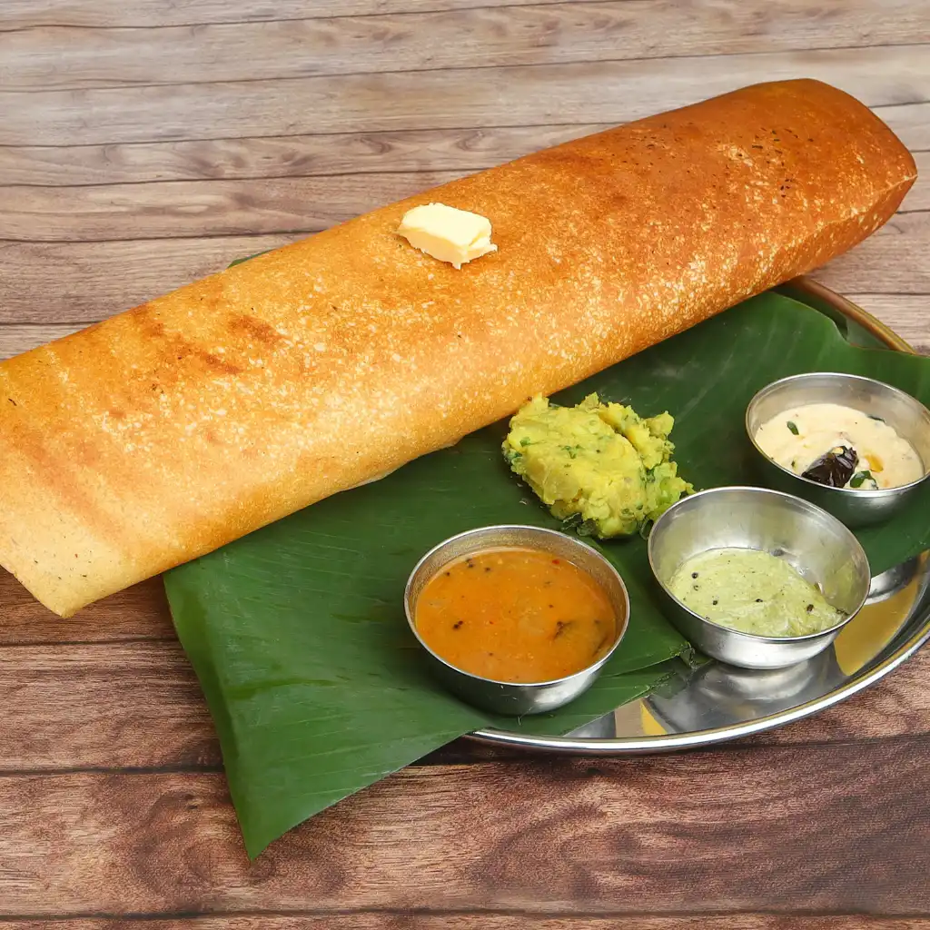 Crispy masala dosa with butter at Vidyarthi Bhavan Bengaluru served with chutneys and sambar