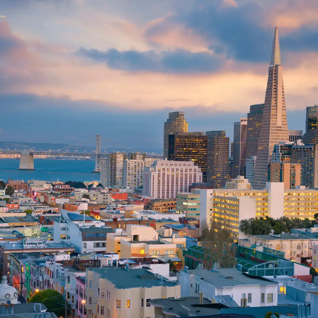 San Francisco skyline at dusk with Transamerica Pyramid and Bay Bridge