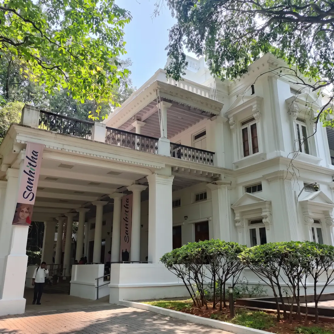 National Gallery of Modern Art Bengaluru heritage building with white columns and colonnade entrance