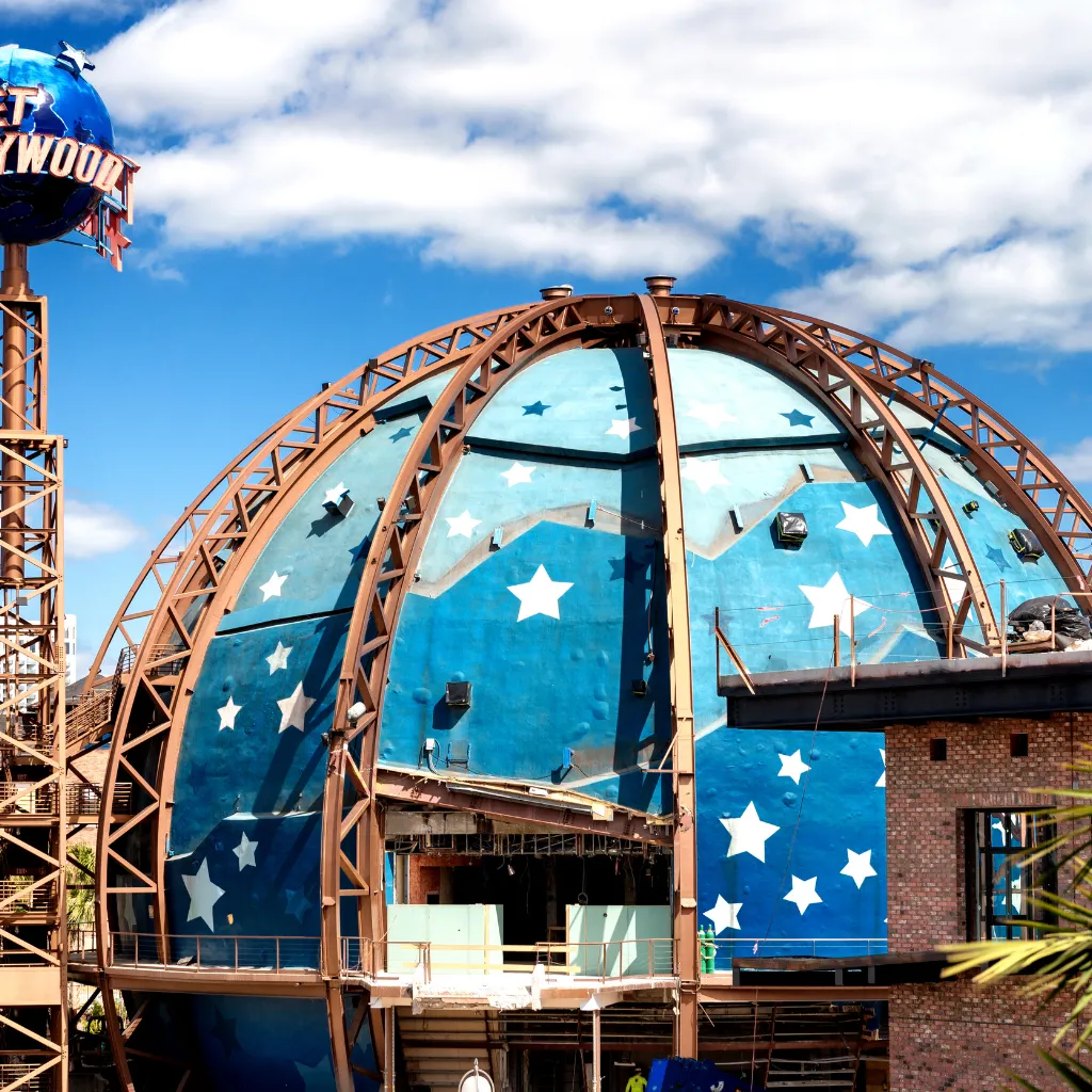 Planet Hollywood Orlando blue dome with white stars, scaffolding and sunny sky view