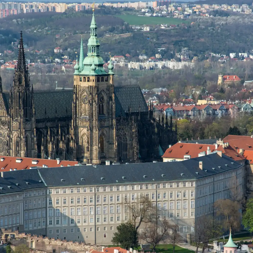 Prague Castle, Prague with St. Vitus Cathedral green spires and historic rooftops