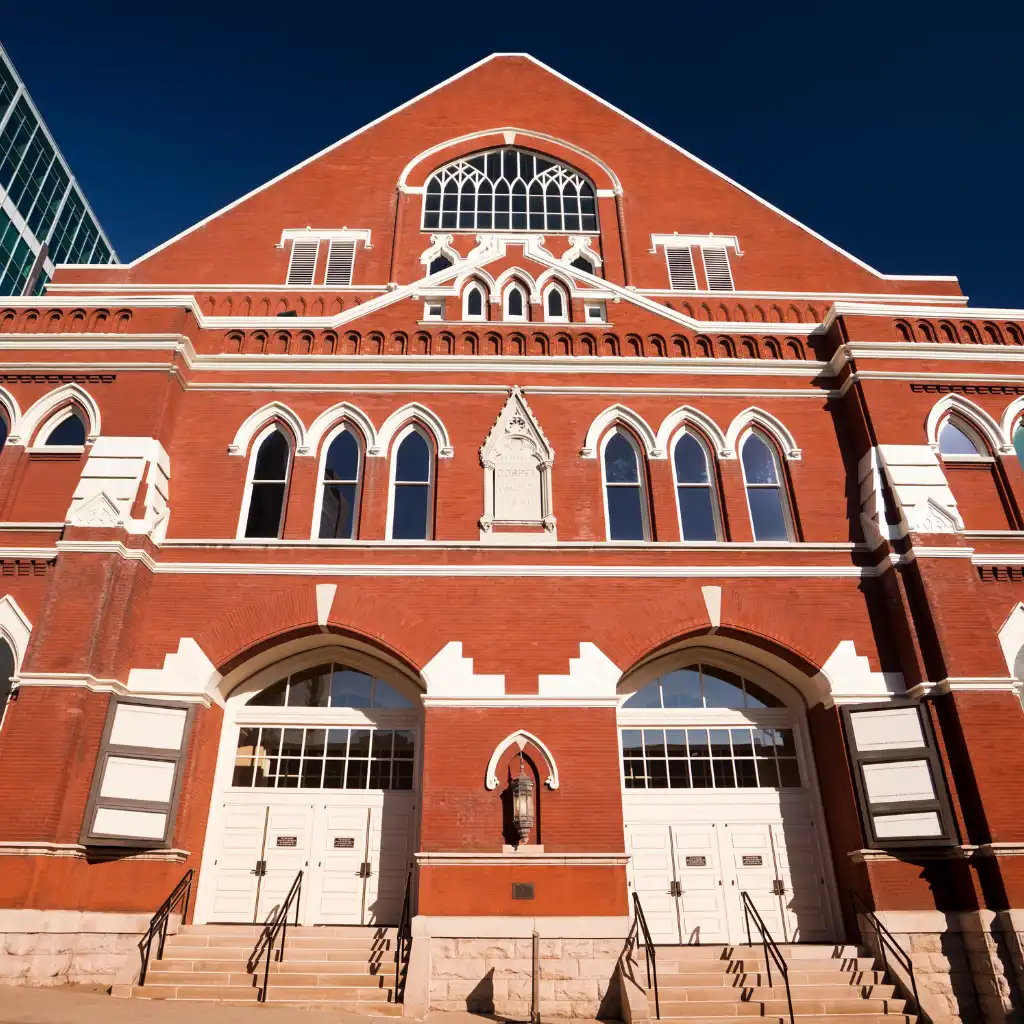 Ryman Auditorium Nashville historic red brick facade with arched windows and entrances