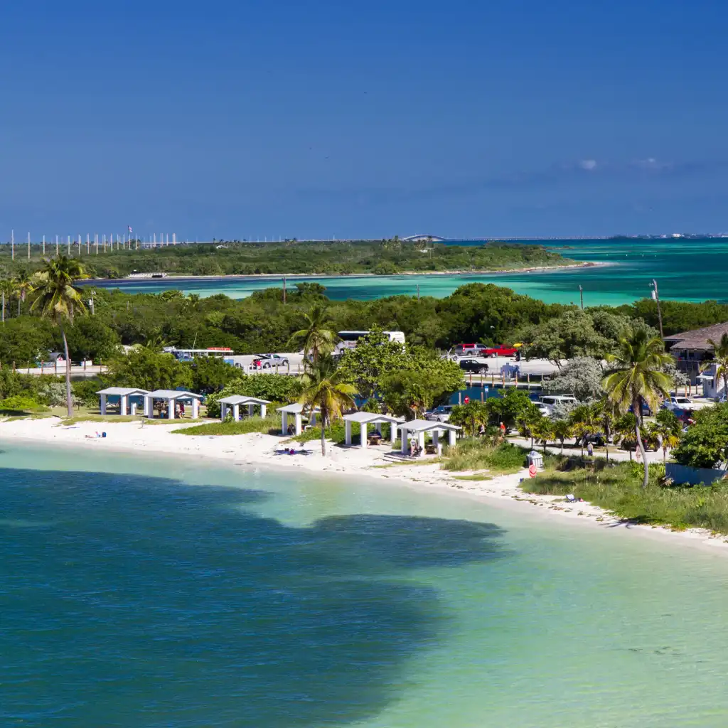 Bahia Honda Florida beach with turquoise waters palm trees and shaded cabanas
