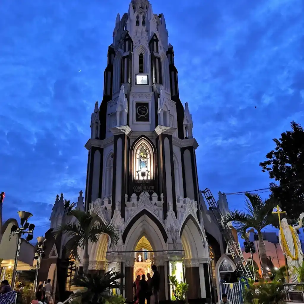 St. Mary's Basilica Bengaluru tower illuminated at dusk in Shivajinagar