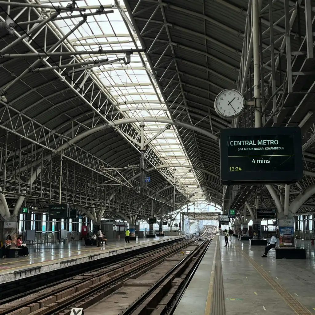 Chennai Metro Train at Central Metro station platform with digital arrival display showing 4 mins