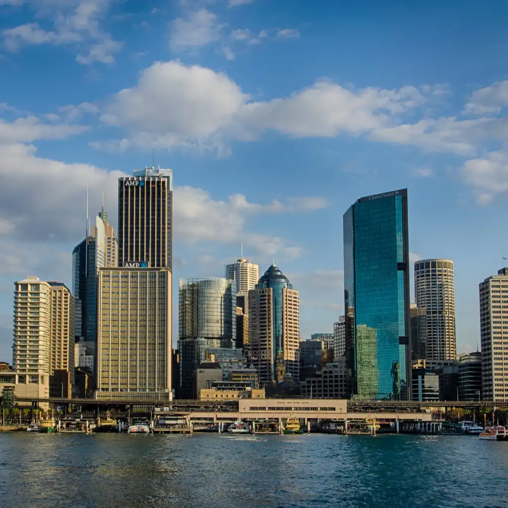 Circular Quay Sydney waterfront with skyscrapers, boats and harbor views on a sunny day