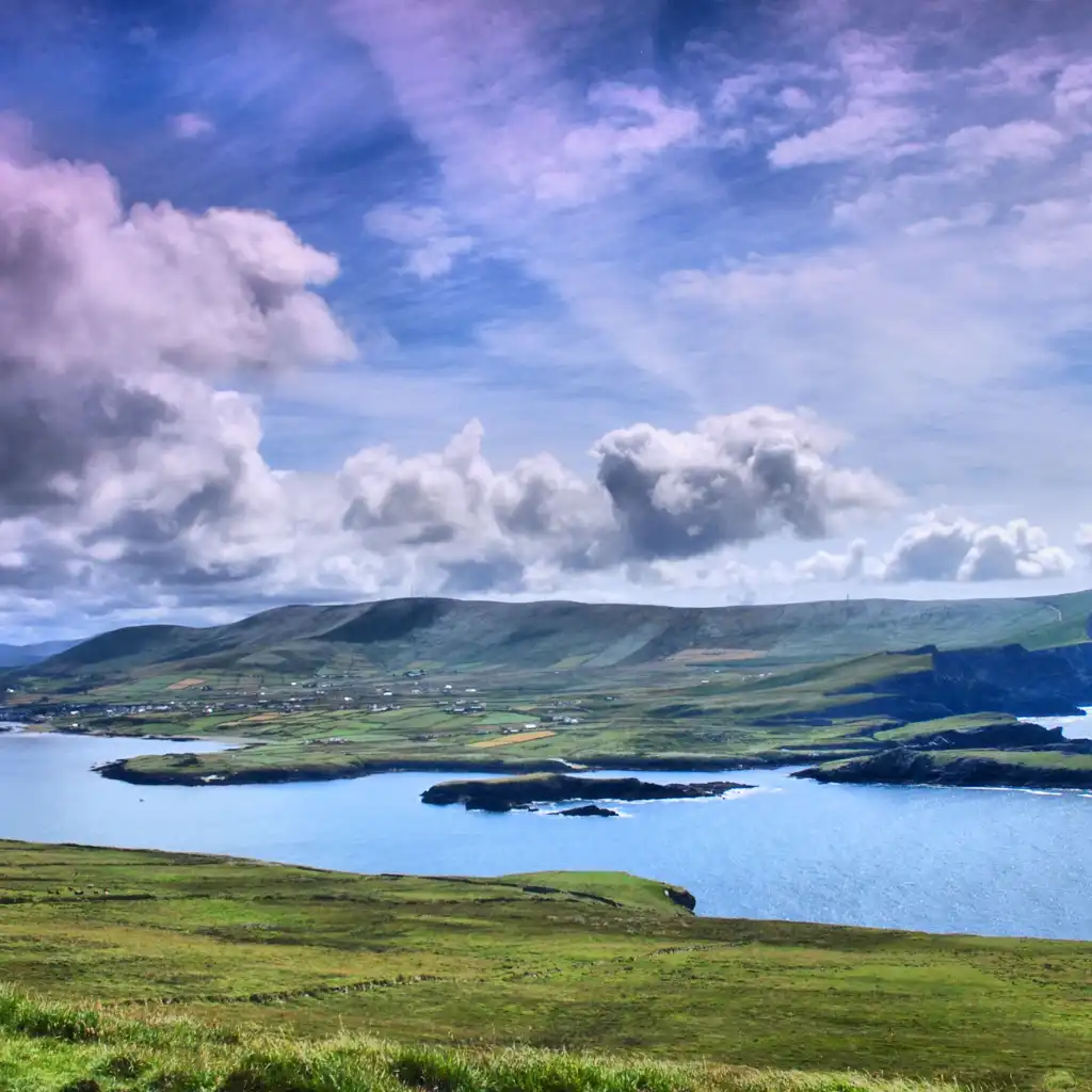 Lush green hills and bay in rural Ireland, scenic spot often missed in rushed 7-day trips