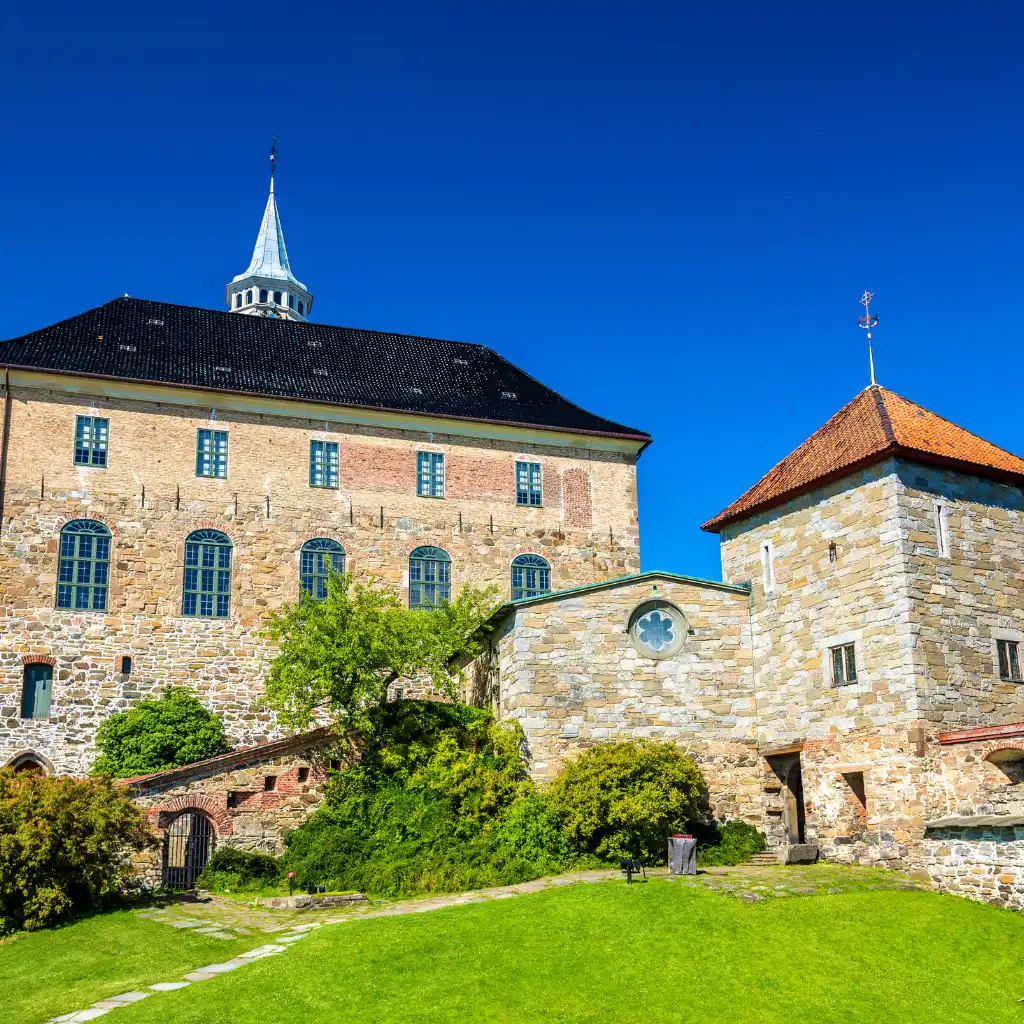 Akershus Fortress Norway stone walls and towers on sunny day in Oslo itinerary