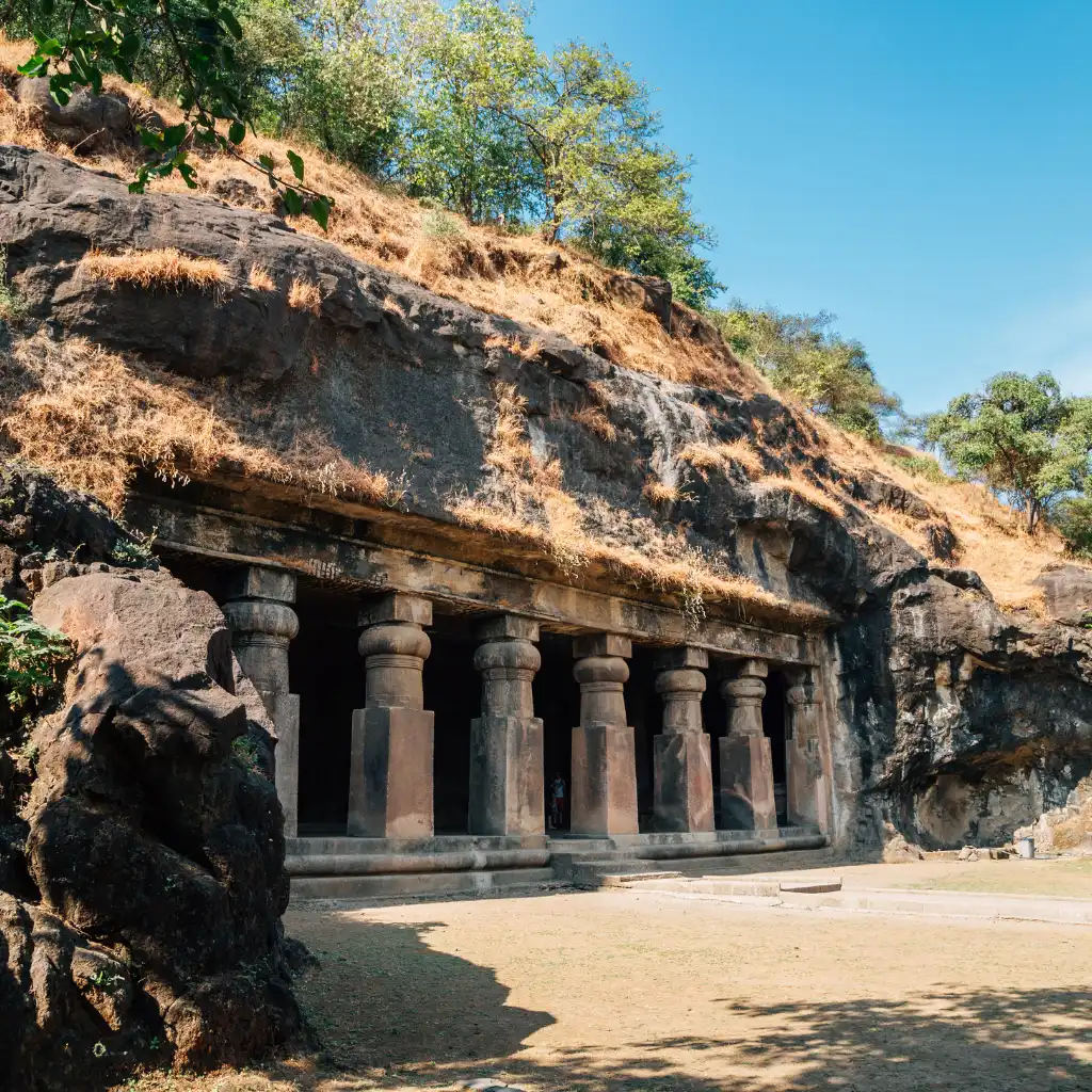 Elephanta Caves Mumbai ancient rock-cut temple entrance with stone pillars on hillside