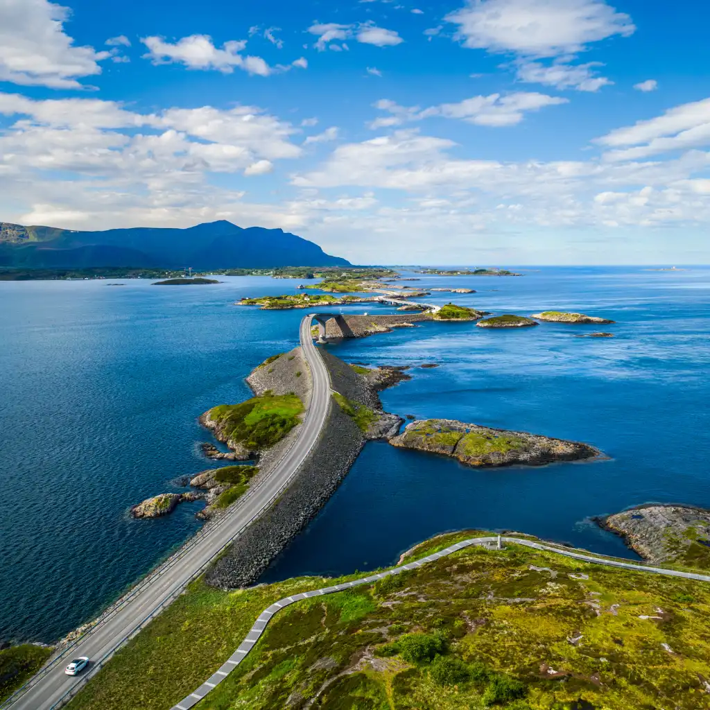 Atlantic Ocean Road Norway scenic drive over bridges linking rocky islands in blue sea