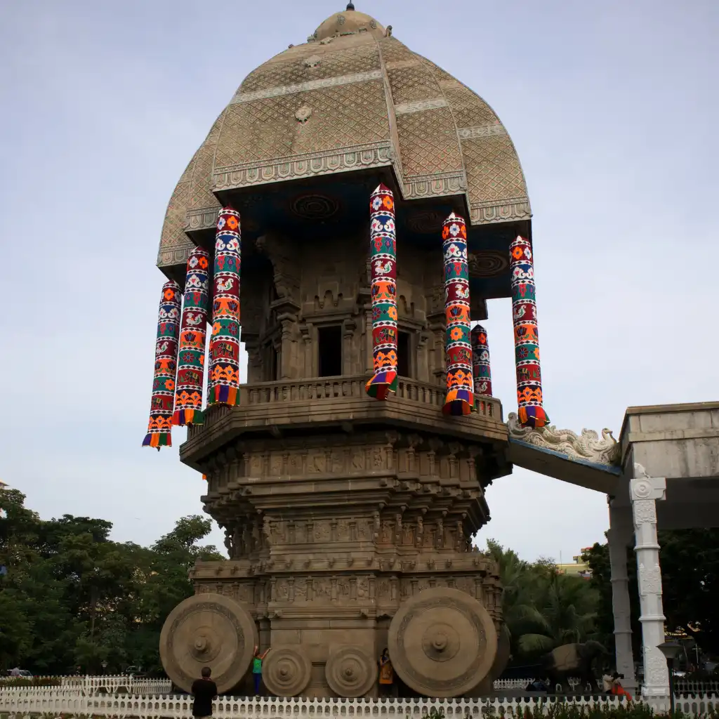 Stone Chariot at Valluvar Kottam Chennai with ornate dome and colorful hangings