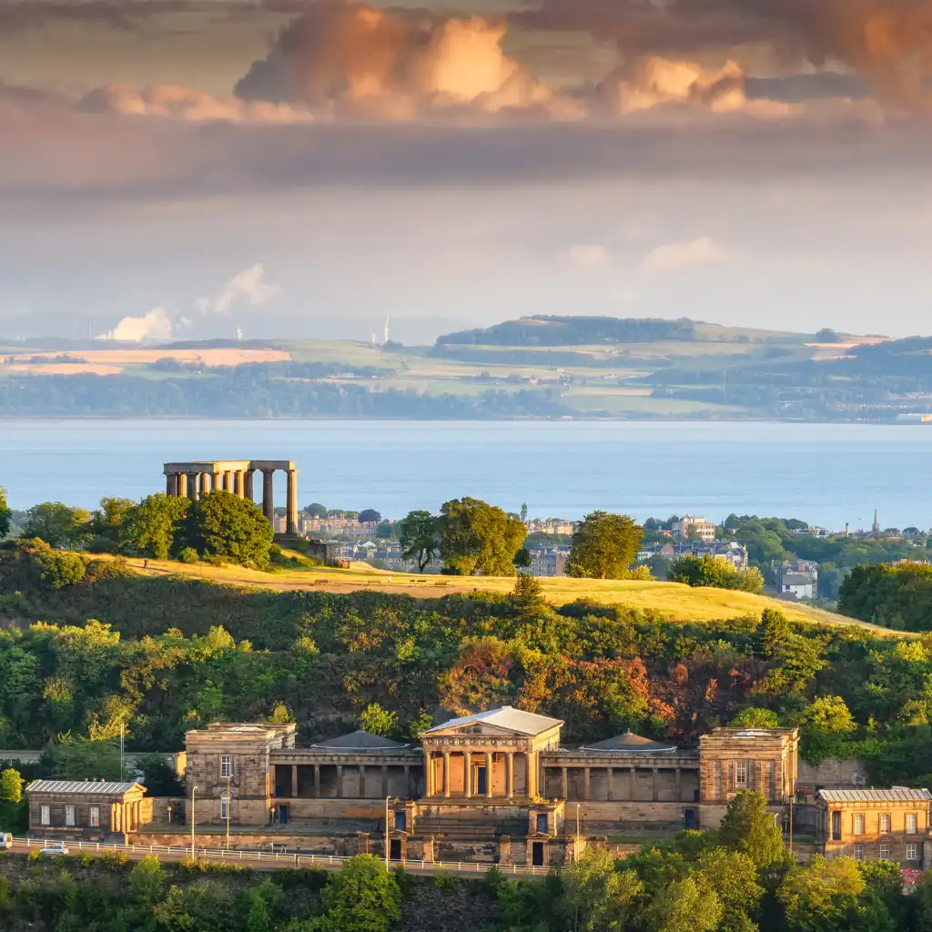 Calton Hill Scotland panoramic skyline with National Monument overlooking Firth of Forth