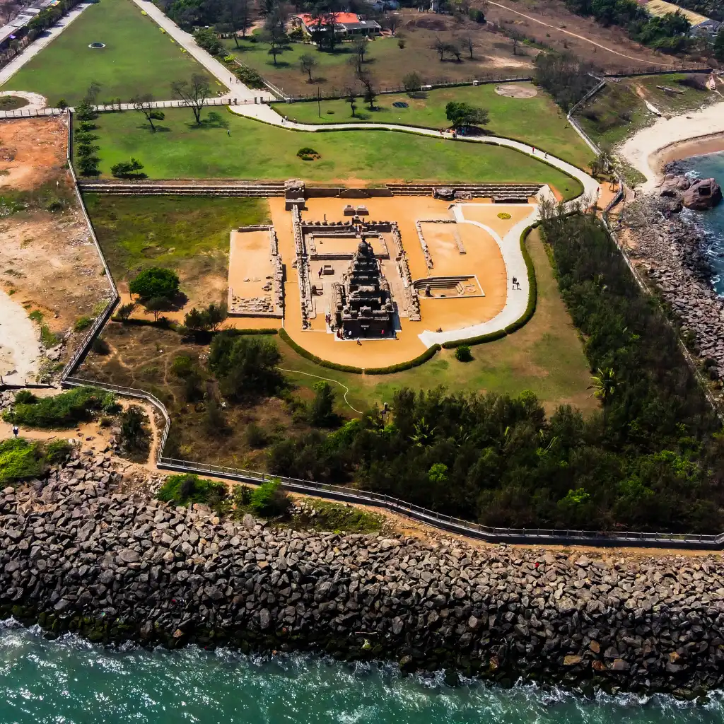 Mahabalipuram Shore Temple Chennai aerial view with ocean waves and rocky shore