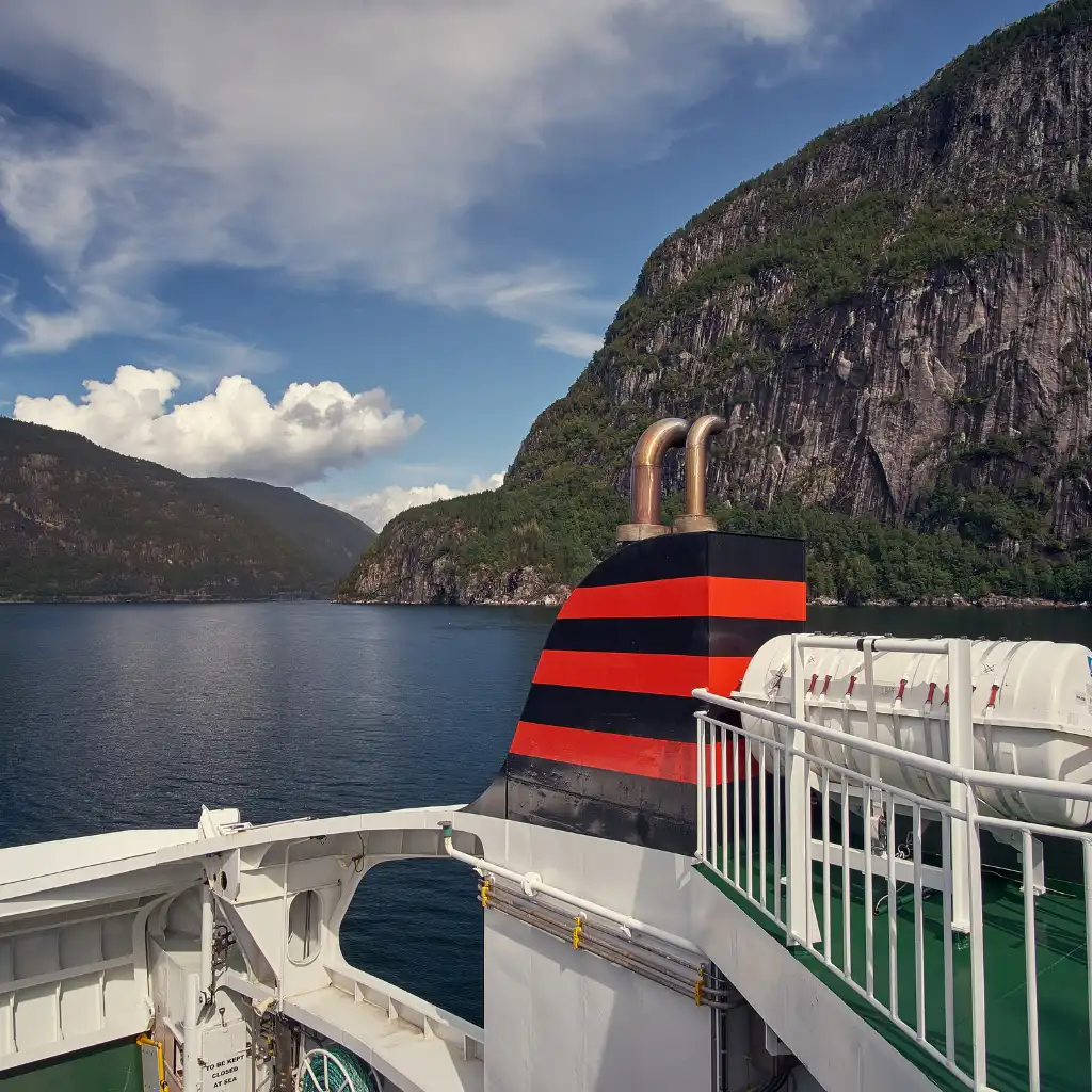 Hardangerfjord Ferry Norway deck view of fjord and steep mountain cliffs