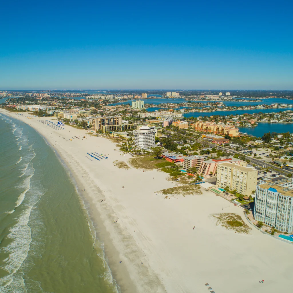 St. Pete Beach Florida aerial view of wide sandy shoreline with hotels and coastal waterway