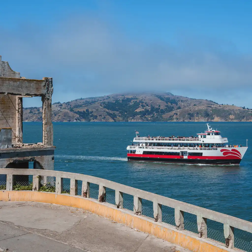 Alcatraz Ferry, California sailing past historic ruins on San Francisco Bay