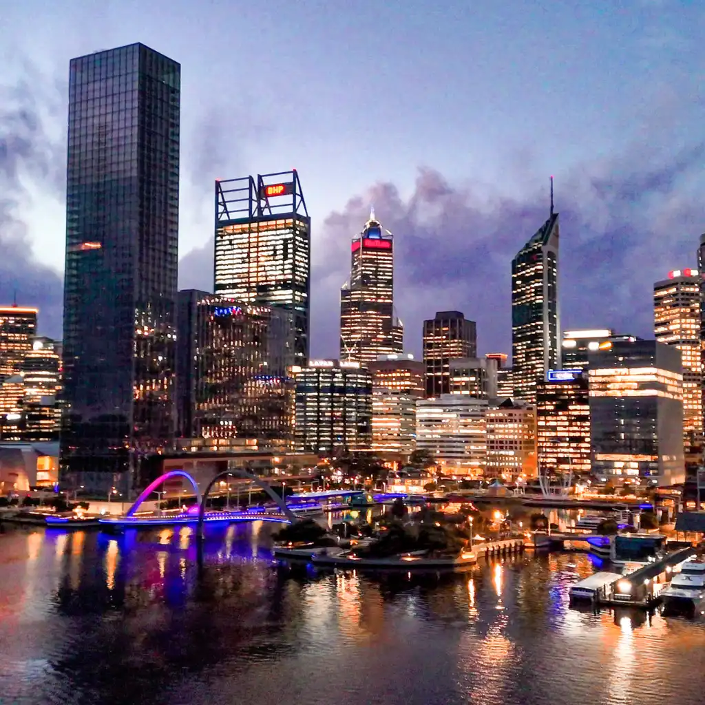 Elizabeth Quay Perth night skyline with CBD lights reflecting on the river waterfront