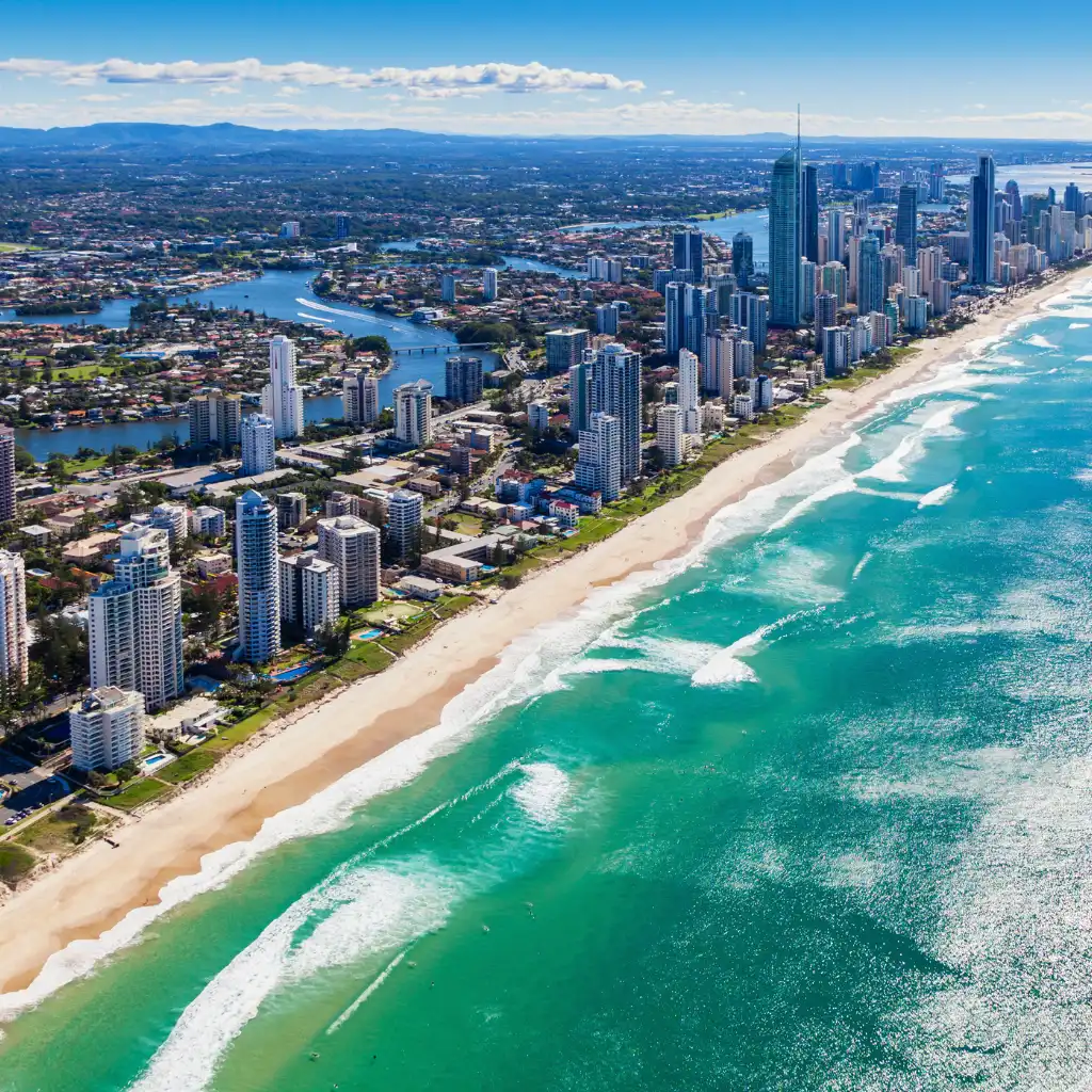 Gold Coast Queensland aerial view of beachfront skyline and turquoise ocean waves